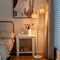 White Standing Floor Lamp with Wicker Shade Resin Trunk Design and Foot Dimmer Metal Frame